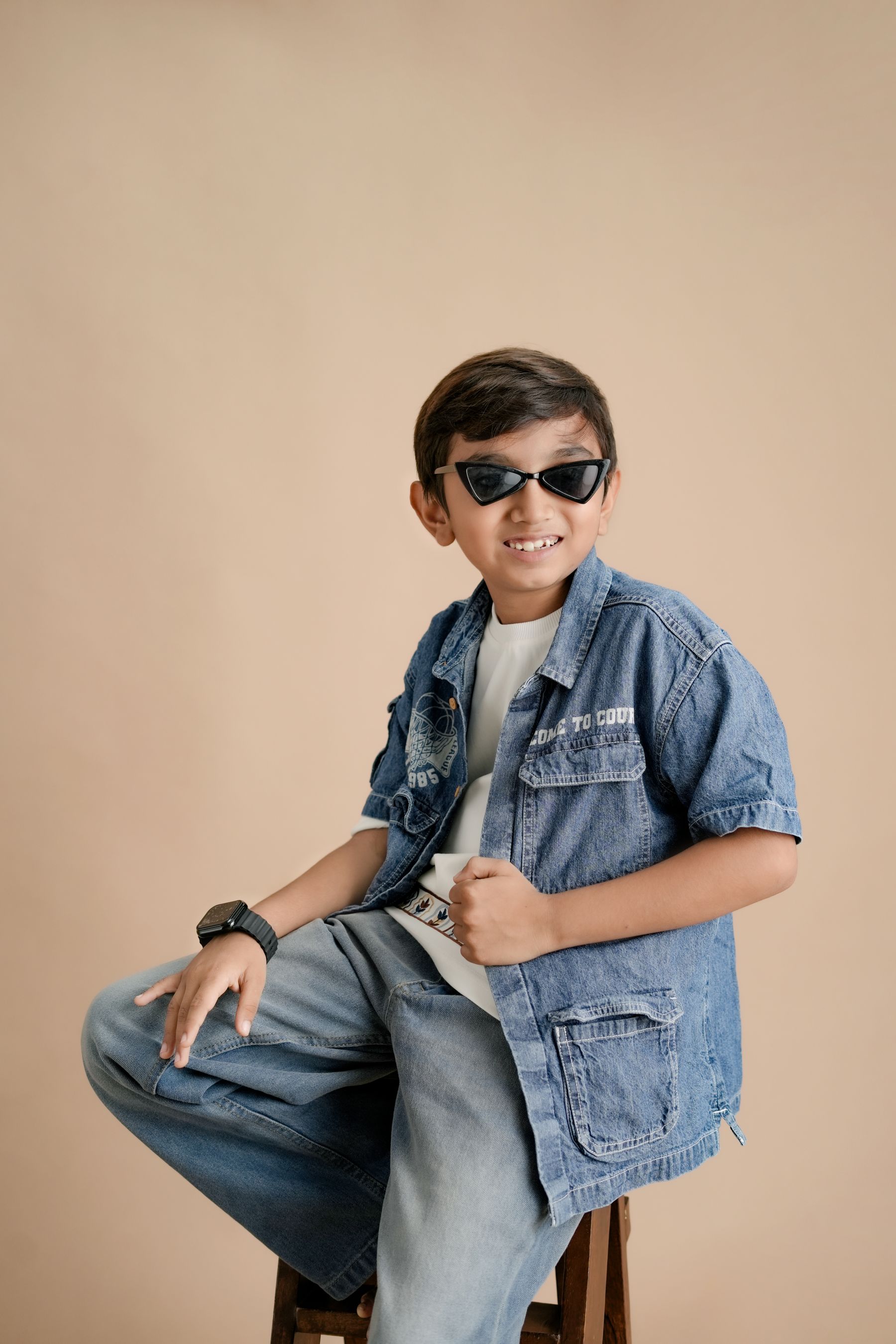 Young model in denim and sunglasses