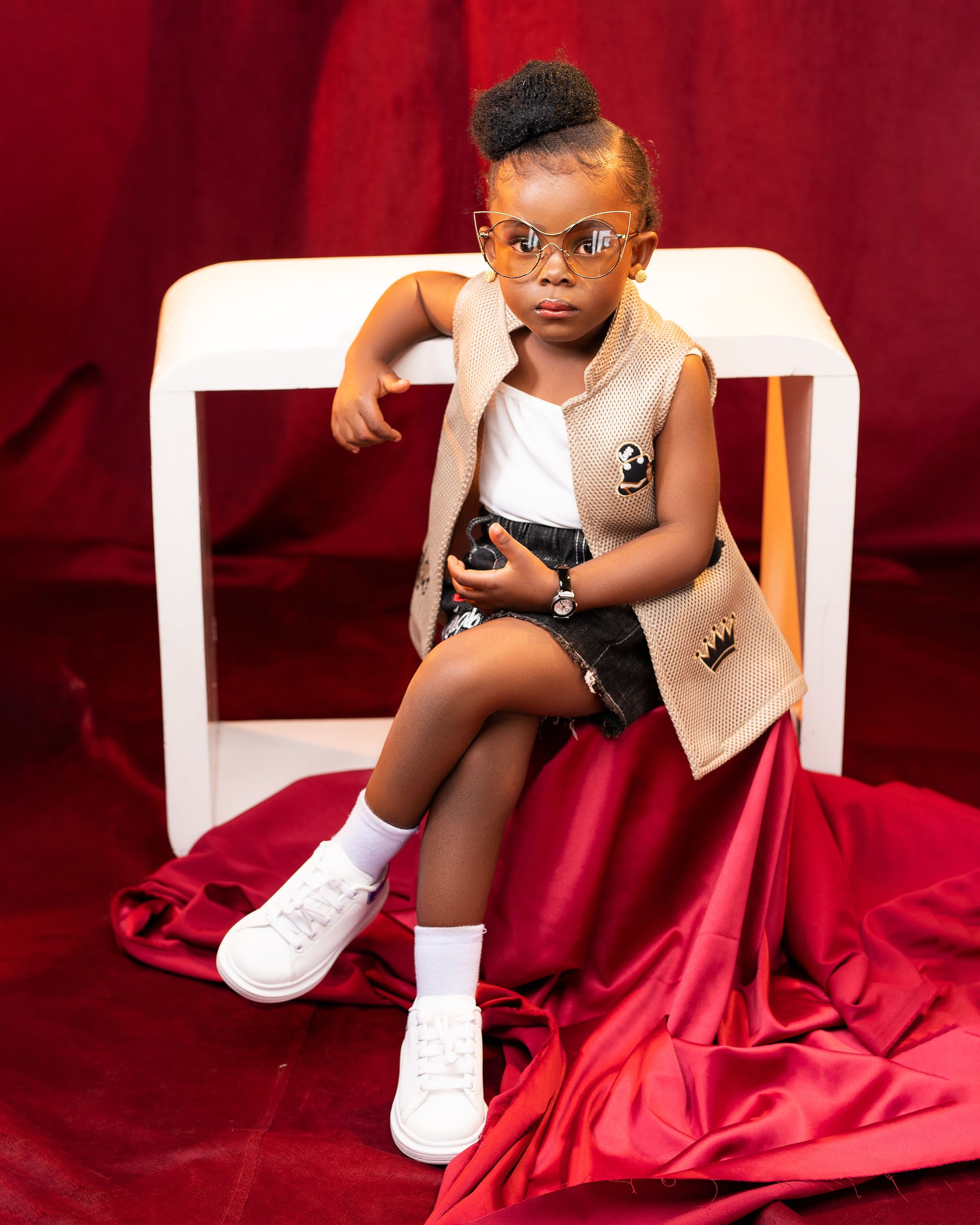 Young model in a dramatic red editorial look