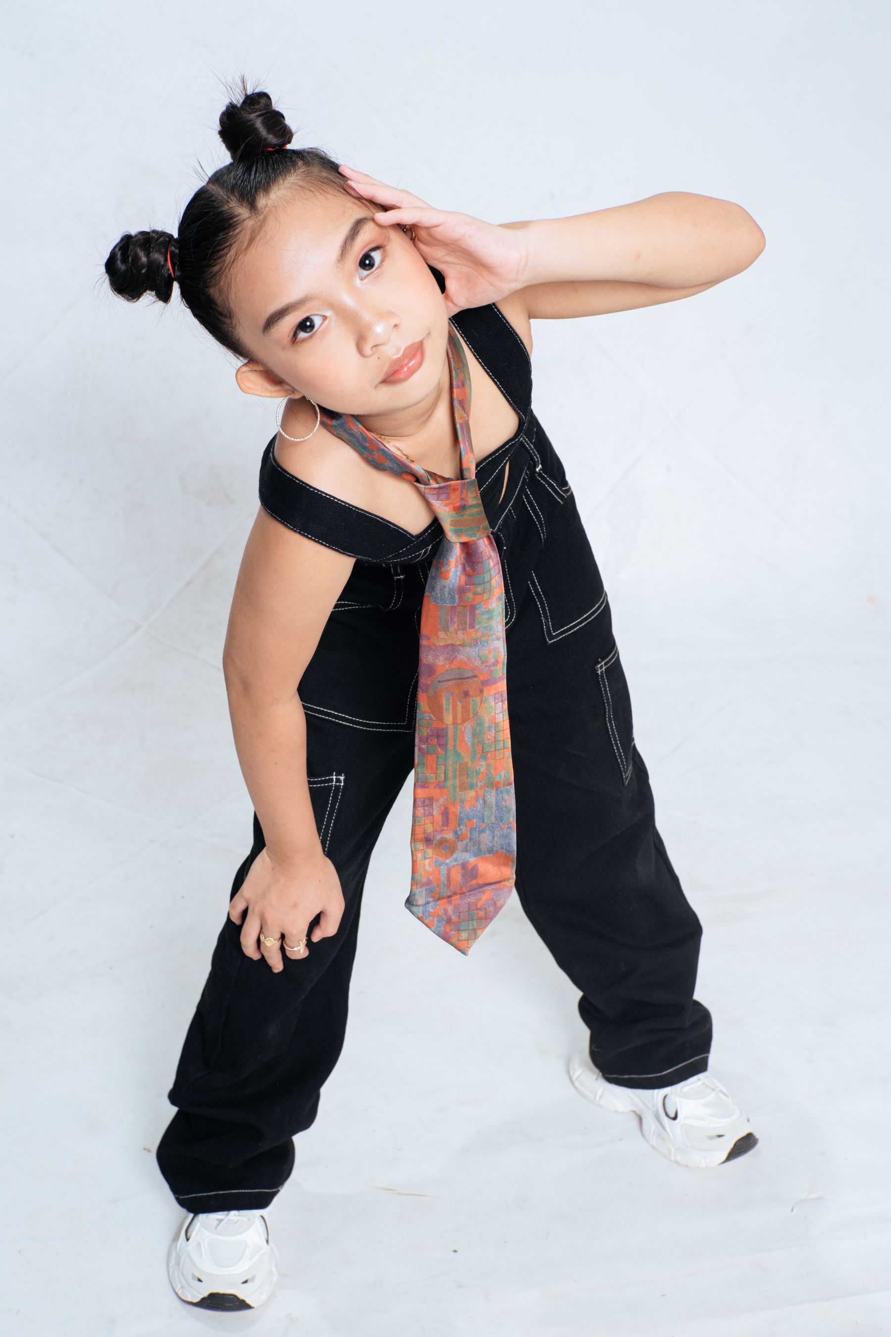Editorial studio portrait of a young model
