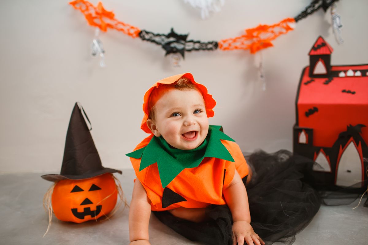Baby in a cute pumpkin costume